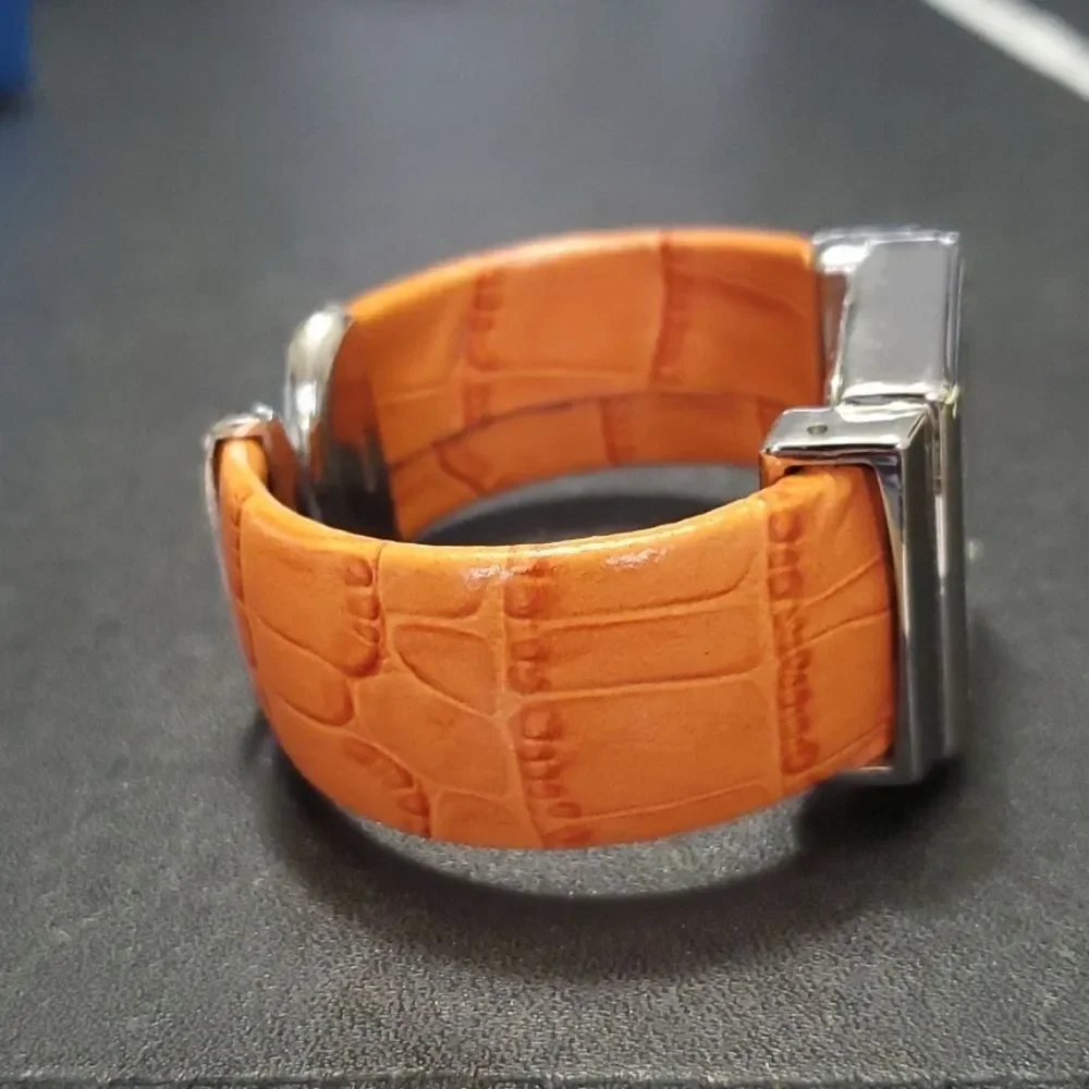 Avon wide cuff watch paprika silver tone IOB Needs Battery